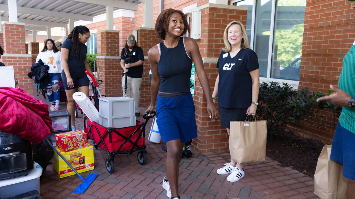 Student moving into dorms